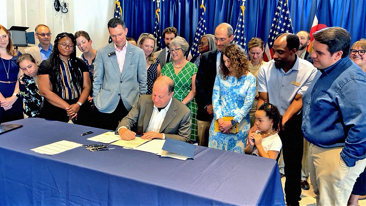 Governor Jared Polis signs HB21-1311 into law, June 23, 2021